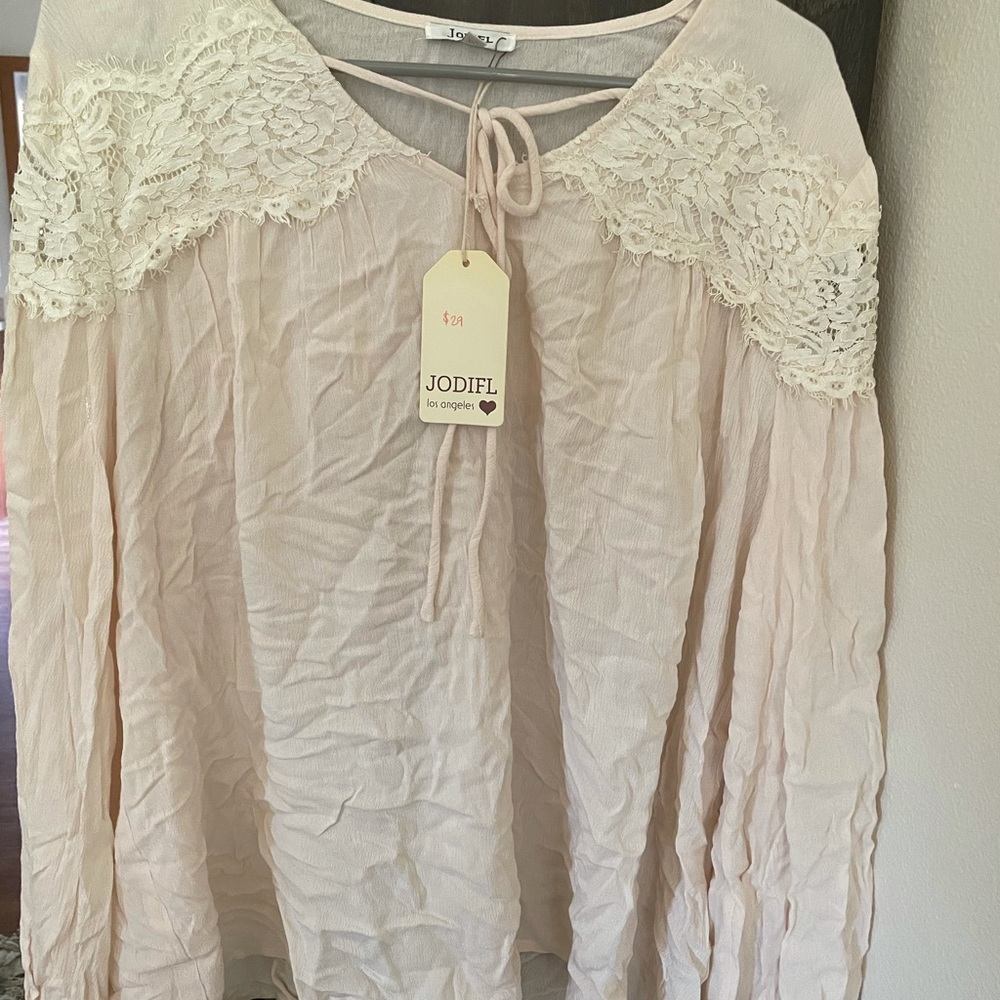 Cream colored lightweight top
